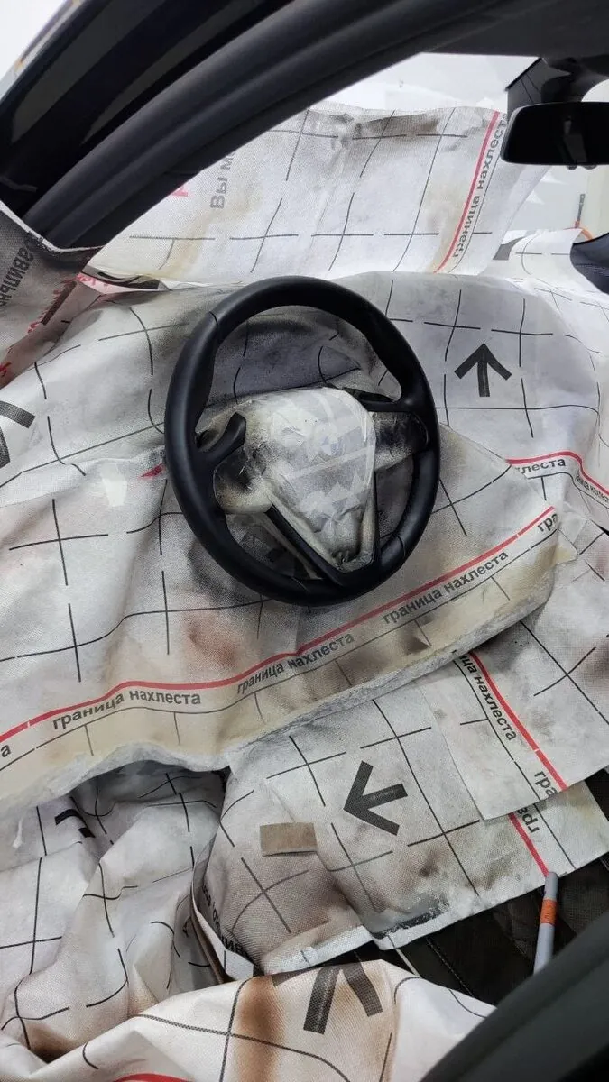 Worn steering wheel before restoration