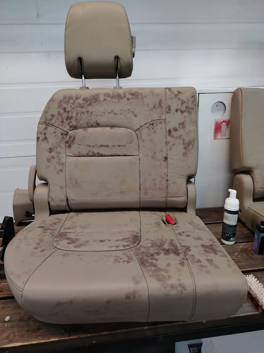 Damaged vehicle seat before restoration